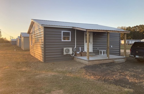 Atmore Cottage | Fern’s Cottage New Construction! A cozy place to relax.