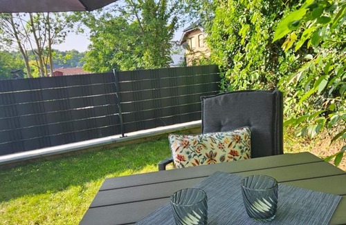 Iversheim Apartment | Fewo Elya – Garden Paradise Near Events, Outlet, and Spa