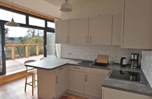 Bad Freienwalde Apartment | FeWo OG am Fluss mit Balkon - ein himmlischer Ausblick