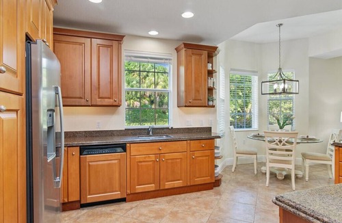 Naples Condo | Fiddler's Creek first floor coach home. 3 bed /3 bath. Bright open floor plan.