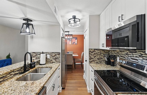 Ederville Condo | Major international sporting event Worker/Media Haven! 2BR/2BA Condo, 30+ Day Stays, A/C, WiFi