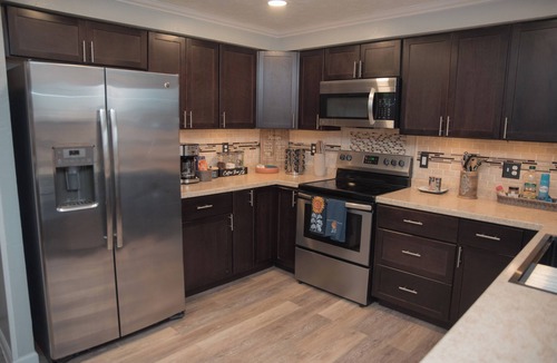 Huber Heights House | Fire Pit, Private Hot Tub + Workspace - Sleeps 7