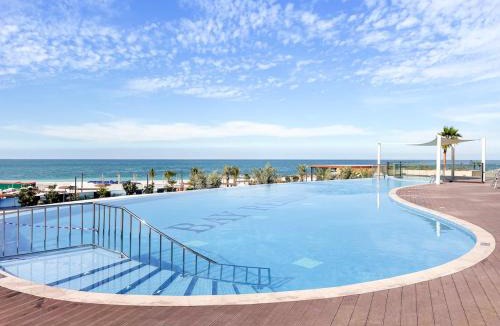 Mina Al Arab Apartment | FIRST CLASS Studio Beach View Living Bliss