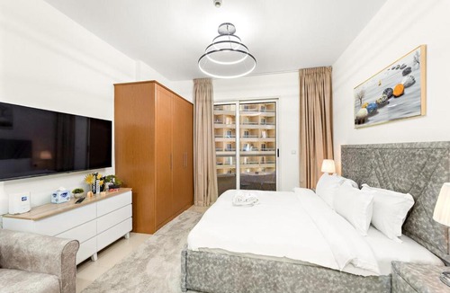Dubai Production City Apartment | FIRST CLASS Studio Cozy & Chic Retreat