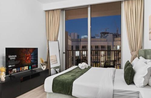 Jumeirah Village Circle Apartment | FIRST CLASS Studio Urban Luxe Getaway