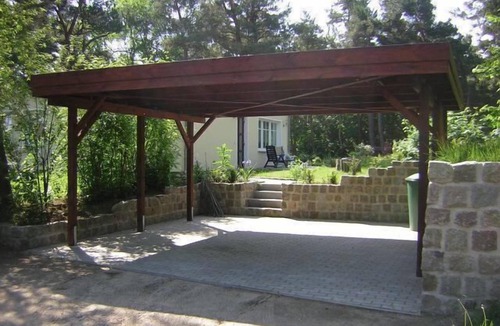 Riemserort House | First floor apartment by the water with terrace, carport parking space and WLAN