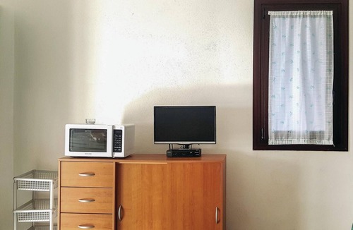 Lu Bagnu Apartment | First floor apartment with shared pool 500 m from the sea in Lu Bagno.