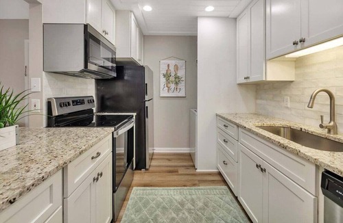Demere Park Condo | First floor condo with access to heated pool!