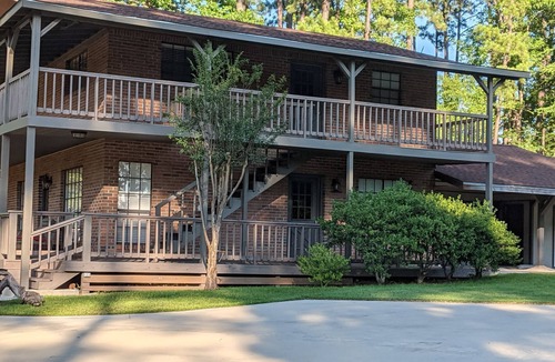 Brookeland House | Fishers Foxhole - two story home with wrap around deck and lake access.