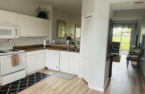 Ole Condo | Flamingo Golf Course 13th Fairway 3 Bedroom, 2 Bath Condo in desirable Lely.