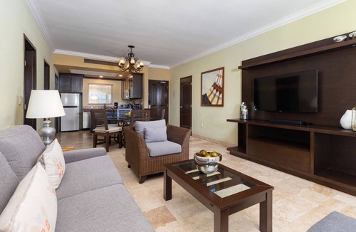 Flamingos Condo | Flamingos Paradise- 2BR Beachside Stay with Pools & Balcony