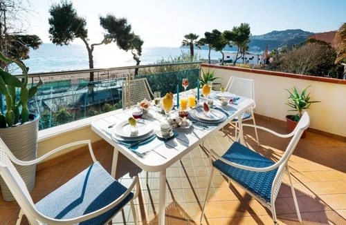 Mazzeo Apartment | Flat directly on the beach Terrace and shared pool