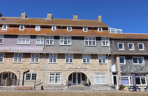 West Bay Cottage | FLAT F BAY HOUSE, family friendly, with a garden in West Bay