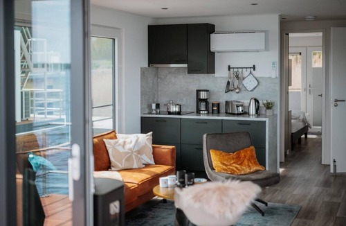 Laasow House | Floatinghouse Cosy Home: lake view, fireplace & terrace with outdoor mooring