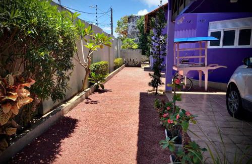 Ponta Negra House | Flor de Ipê Hostel