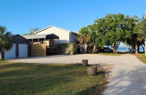 Florida Panhandle RV Rental | Florida Waterfront RV site w/Endless Sunsets on eastern shore of Escambia Bay.