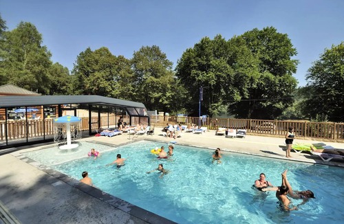 Treignac House | Flower Camping La Plage * - Mobil home Comfort 31m2 (3 bedrooms) + TV + semi-covered terrace of 18 m2 8 people
