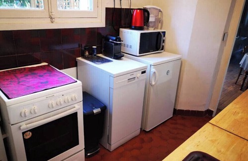 Saint-Louis Apartment | For working or visiting, quiet, first floor with small private courtyard.