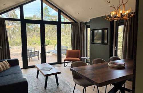 Lattrop House | Forest Lodge for 6 people located on the edge of the park with views of the forest. Spacious holiday home with 3 bedrooms, a terrace and plenty of privacy in nature.