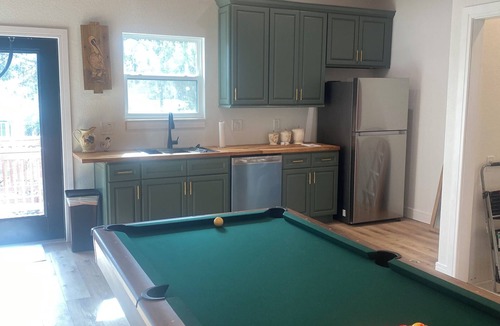 Astor House | Forget your worries in this serene space. New 4-bedroom 4 bath house in Astor