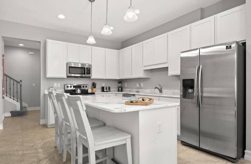 Indian Harbour Beach House | Fortebello townhouse w/pool, BBQ & backyard