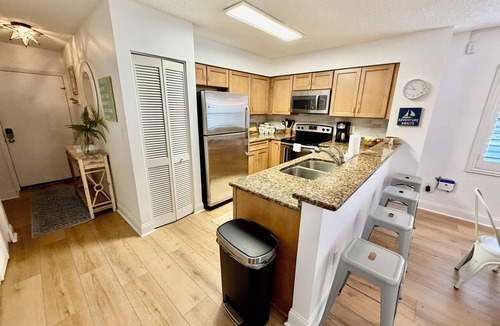Butler Beach Condo | FREE FUN during your stay in this Gold-rated condo with beautiful ocean view and easy access to the pool and beach!