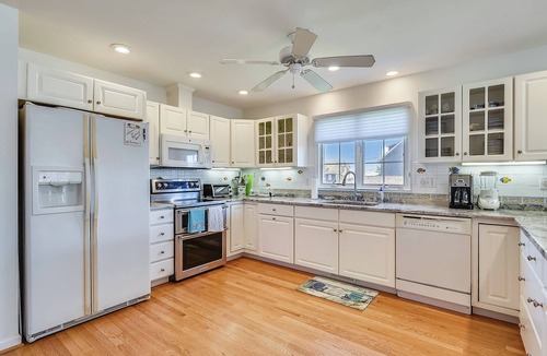 Bethany Beach House | Free Golf at Bear Trap Dunes and MORE! Awesome family vacation home nestled in the heart of downtown Bethany Beach and only a short stroll from the surf and sand!