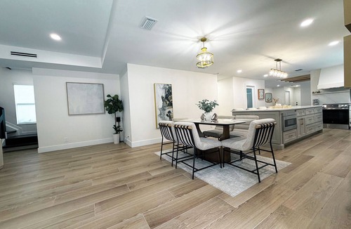 Jupiter House | Fresh Remodel Jupiter Retreat: 4BR Family Oasis - Heated Pool - Putting Green