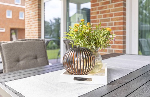 Wangerland Apartment | Friesenkoje vacation apartment: modern relaxation on the North Sea coast.