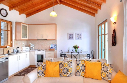 Longos House | From its elevated position directly above Levrecchio beach, this wonderfully light and airy villa en