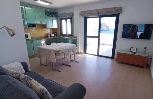 Gran Tarajal Apartment | Front line beach penthouse with spectacular views