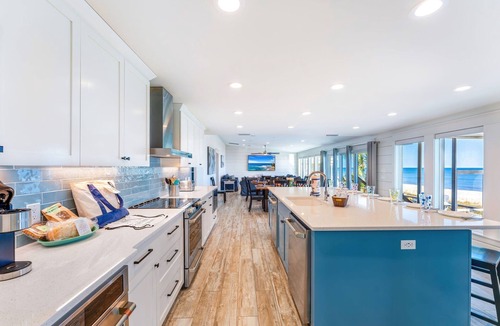 St. George Island House | Front Row Center - Pet Friendly, Private Pool, Beach Front, Hot Tub!