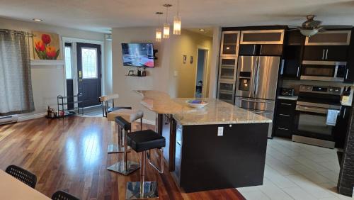 Thompson House | Fully Furnished, Spacious 4BR Family Home - Wine Fridge, Patio, Corporate Housing
