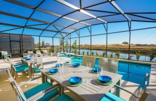 Crescent Lakes House | Fully Refurbished Vacation Home with South Facing Pool and Spa with Lake View in Quiet Community Nr Disney