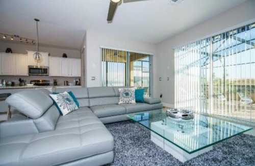 Crescent Lakes House | Fully Refurbished Vacation Home with South Facing Pool and Spa with Lake View in Quiet Community Nr Disney