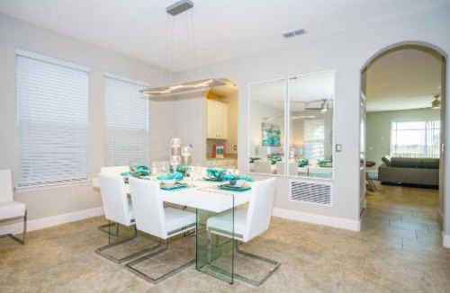 Crescent Lakes House | Fully Refurbished Vacation Home with South Facing Pool and Spa with Lake View in Quiet Community Nr Disney
