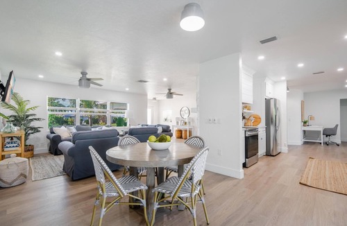 Palm River Estates House | Fully Updated Lake Front Home With Heated Pool!