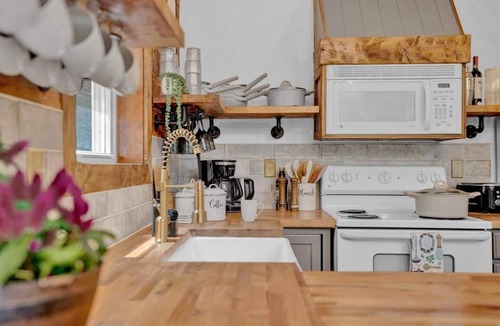 Gouldsboro Ski Chalet | FUN-FILLED A-Frame Chalet in the resort-like Big Bass Lake Community in the Poconos! ⊹ Movie Theater ⊹ Arcade Room ⊹ Hot Tub ⊹ Mini Golf ⊹ Indoor Fireplace ⊹ Outdoor Fire Pit