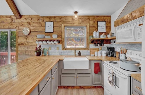 Gouldsboro Ski Chalet | FUN-FILLED A-Frame Chalet in the resort-like Big Bass Lake Community in the Poconos! ⊹ Movie Theater ⊹ Arcade Room ⊹ Hot Tub ⊹ Mini Golf ⊹ Indoor Fireplace ⊹ Outdoor Fire Pit
