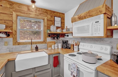 Gouldsboro Ski Chalet | FUN-FILLED A-Frame Chalet in the resort-like Big Bass Lake Community in the Poconos! ⊹ Movie Theater ⊹ Arcade Room ⊹ Hot Tub ⊹ Mini Golf ⊹ Indoor Fireplace ⊹ Outdoor Fire Pit