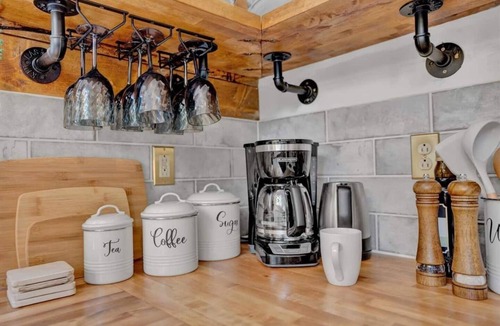 Gouldsboro Ski Chalet | FUN-FILLED A-Frame Chalet in the resort-like Big Bass Lake Community in the Poconos! ⊹ Movie Theater ⊹ Arcade Room ⊹ Hot Tub ⊹ Mini Golf ⊹ Indoor Fireplace ⊹ Outdoor Fire Pit