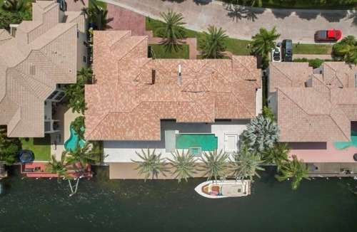 Hollywood South Central Beach House | Furnished Waterfront Rental House with Dock and Boat Access