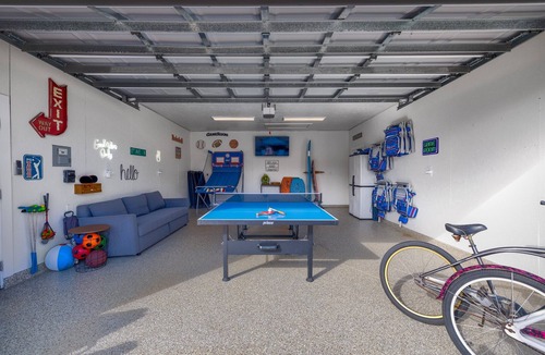 Jacksonville Beach House | Game-On Backyard | Pool, Turf Field & Golf Cart