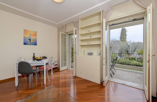 Sirmione Apartment | Garda Amore: Deluxe Two-Bedroom Suite with Lake & City View in Sirmione Old Town
