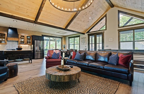 Cherry Log Cabin | Gated mountaintop retreat with expansive outdoor living, game tables, & hot tub