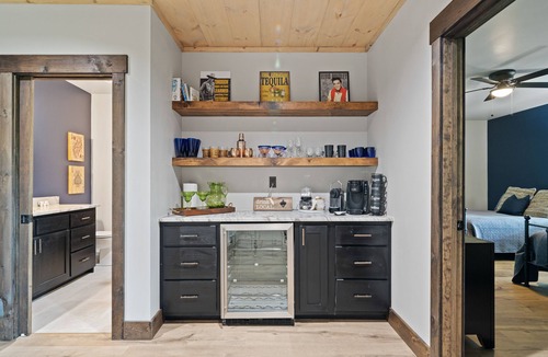Cherry Log Cabin | Gated mountaintop retreat with expansive outdoor living, game tables, & hot tub