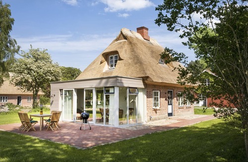 Holzdorf House | Gem under thatch with stove and sauna