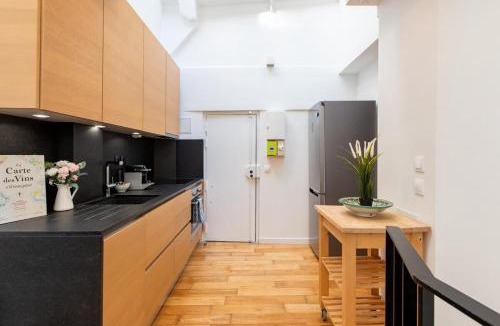 Quartier de la Folie-Mericourt Apartment | Geranimus Republic Square