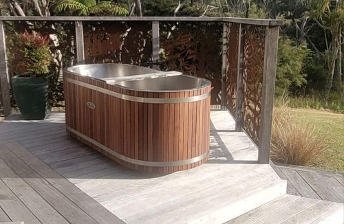 Waitakere RV Rental | Glamping in Waitakere in this Luxury Safari Tent Rental, for the Best Vacations in New Zealand