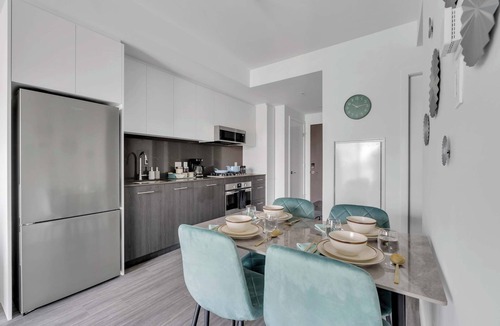 Eau Claire Apartment | Golden Horizon Luxe Comfort & Iconic City Views